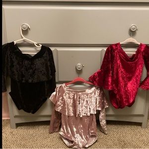 Three 2T velour body suits